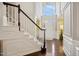 Two-story entryway with hardwood floors and a grand staircase at 206 Joseph Pond Ln, Cary, NC 27519