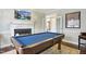 Game room showcasing a pool table and fireplace at 206 Joseph Pond Ln, Cary, NC 27519