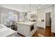 White kitchen with stainless steel appliances and large island at 206 Joseph Pond Ln, Cary, NC 27519