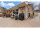 Spacious deck with seating area, grill, and tranquil wooded views at 2208 Lawrence Dr, Raleigh, NC 27603