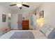 Spacious main bedroom with hardwood floors and ensuite bathroom access at 2208 Lawrence Dr, Raleigh, NC 27603