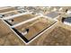Aerial view of the home's backyard with a white vinyl fence at 256 Barbour Farm Ln, Four Oaks, NC 27524