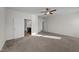 Spacious main bedroom providing access to both en suite bathroom and walk in closet at 256 Barbour Farm Ln, Four Oaks, NC 27524