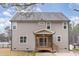 Exterior view of a two-story house with screened porch at 296 Wilson Farm Ln, Clayton, NC 27527