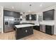 Modern kitchen with stainless steel appliances, granite countertops, and a kitchen island at 296 Wilson Farm Ln, Clayton, NC 27527