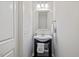 Small, well-appointed bathroom with a pedestal sink at 309 Dechlan Ln, Cary, NC 27513