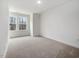Spacious bedroom with carpet and large windows at 310 Church St # 35, Wendell, NC 27591