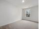 Simple bedroom with carpet and a window at 310 Church St # 35, Wendell, NC 27591