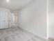 Bright bedroom with carpet and access to hallway at 310 Church St # 35, Wendell, NC 27591