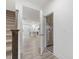 Open entryway with view of kitchen and staircase at 310 Church St # 35, Wendell, NC 27591