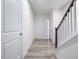 Stairway and hardwood floors in a bright hallway at 310 Church St # 35, Wendell, NC 27591