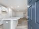 Modern kitchen with white cabinets and quartz island at 310 Church St # 35, Wendell, NC 27591