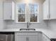 Kitchen sink and countertop with white cabinets at 310 Church St # 35, Wendell, NC 27591
