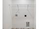 Bright laundry room with shelving and vinyl flooring at 310 Church St # 35, Wendell, NC 27591