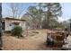 Large backyard with shed, playset, and basketball hoop at 4209 Medlar Ln, Raleigh, NC 27616