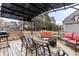 Relaxing backyard deck featuring fire pit and comfortable seating at 4209 Medlar Ln, Raleigh, NC 27616