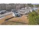 Aerial view of house and neighborhood; showcasing the property and surroundings at 467 Joseph Alexander Dr, Fuquay Varina, NC 27526