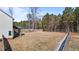 Large backyard with wooden fence and a hammock at 467 Joseph Alexander Dr, Fuquay Varina, NC 27526