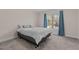 Bedroom with a double bed and window view at 467 Joseph Alexander Dr, Fuquay Varina, NC 27526