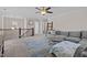 Open bonus room features a sectional sofa and fireplace at 467 Joseph Alexander Dr, Fuquay Varina, NC 27526