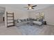 Bonus room with sectional sofa and built-in shelving at 467 Joseph Alexander Dr, Fuquay Varina, NC 27526