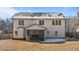 Two-story house back with covered patio and fenced backyard at 467 Joseph Alexander Dr, Fuquay Varina, NC 27526
