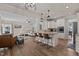 Stylish kitchen featuring granite countertops, an island with bar seating, and stainless steel appliances at 467 Joseph Alexander Dr, Fuquay Varina, NC 27526
