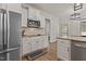 Modern kitchen with stainless steel appliances, granite countertops, and plenty of storage space at 467 Joseph Alexander Dr, Fuquay Varina, NC 27526