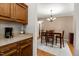 View of dining area with table and chairs from kitchen at 59 Irene Ct, Fuquay Varina, NC 27526