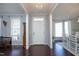 Bright entryway with hardwood floors and views to dining area at 60 Green Meadow Ct, Pittsboro, NC 27312