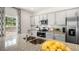 Modern kitchen with granite countertops and stainless steel appliances at 6461 Alfalfa Ln, Wake Forest, NC 27587