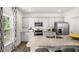 Modern kitchen featuring granite countertops and stainless steel appliances at 6461 Alfalfa Ln, Wake Forest, NC 27587