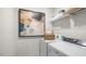 Clean laundry room with washer, dryer, and shelving at 6461 Alfalfa Ln, Wake Forest, NC 27587