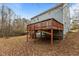 View of wooden deck in the backyard of this home at 6645 Austin Creek Dr, Wake Forest, NC 27587