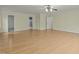Large bedroom with hardwood floors and access to bathroom at 6645 Austin Creek Dr, Wake Forest, NC 27587