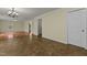Bright hallway with hardwood floors and access to other rooms at 6645 Austin Creek Dr, Wake Forest, NC 27587