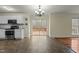 Kitchen with stainless steel appliances and deck access at 6645 Austin Creek Dr, Wake Forest, NC 27587