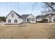 Lovely two-story home with a spacious front yard and landscaping at 701 Occoneechee Dr, Fuquay Varina, NC 27526