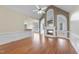 Living room with hardwood floors, fireplace and high ceiling at 701 Occoneechee Dr, Fuquay Varina, NC 27526