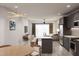Open concept kitchen with island and modern appliances at 711 E Lenoir St # 205, Raleigh, NC 27601