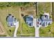 Aerial view of a two-house property with large yards, driveway, and detached shed at 798 Christian Light Rd, Fuquay Varina, NC 27526