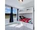 bedroom with a bunk bed, carpet floors, window, and storage drawers at 798 Christian Light Rd, Fuquay Varina, NC 27526