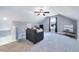 Cozy bonus room with neutral paint, plush carpet, and a ceiling fan for comfortable living at 798 Christian Light Rd, Fuquay Varina, NC 27526