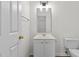 Clean bathroom with white vanity and updated fixtures at 800 Moratuck Dr # 308, Raleigh, NC 27604