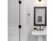 Modern bathroom with a pedestal sink and black fixtures at 917 Myers Point Dr # 21, Morrisville, NC 27560