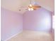 Large bedroom with vaulted ceiling, ceiling fan, and ample closet space at 1 Danforth Pl, Durham, NC 27712