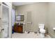 Bathroom with toilet, sink, and shower at 1026 Nashville Rd, Rocky Mount, NC 27803