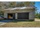 Block building with double doors, offering storage space at 1026 Nashville Rd, Rocky Mount, NC 27803