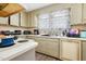 Kitchen with white cabinets, sink, and appliances at 1026 Nashville Rd, Rocky Mount, NC 27803