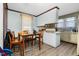 Kitchen with wood cabinets and a stove at 1026 Nashville Rd, Rocky Mount, NC 27803